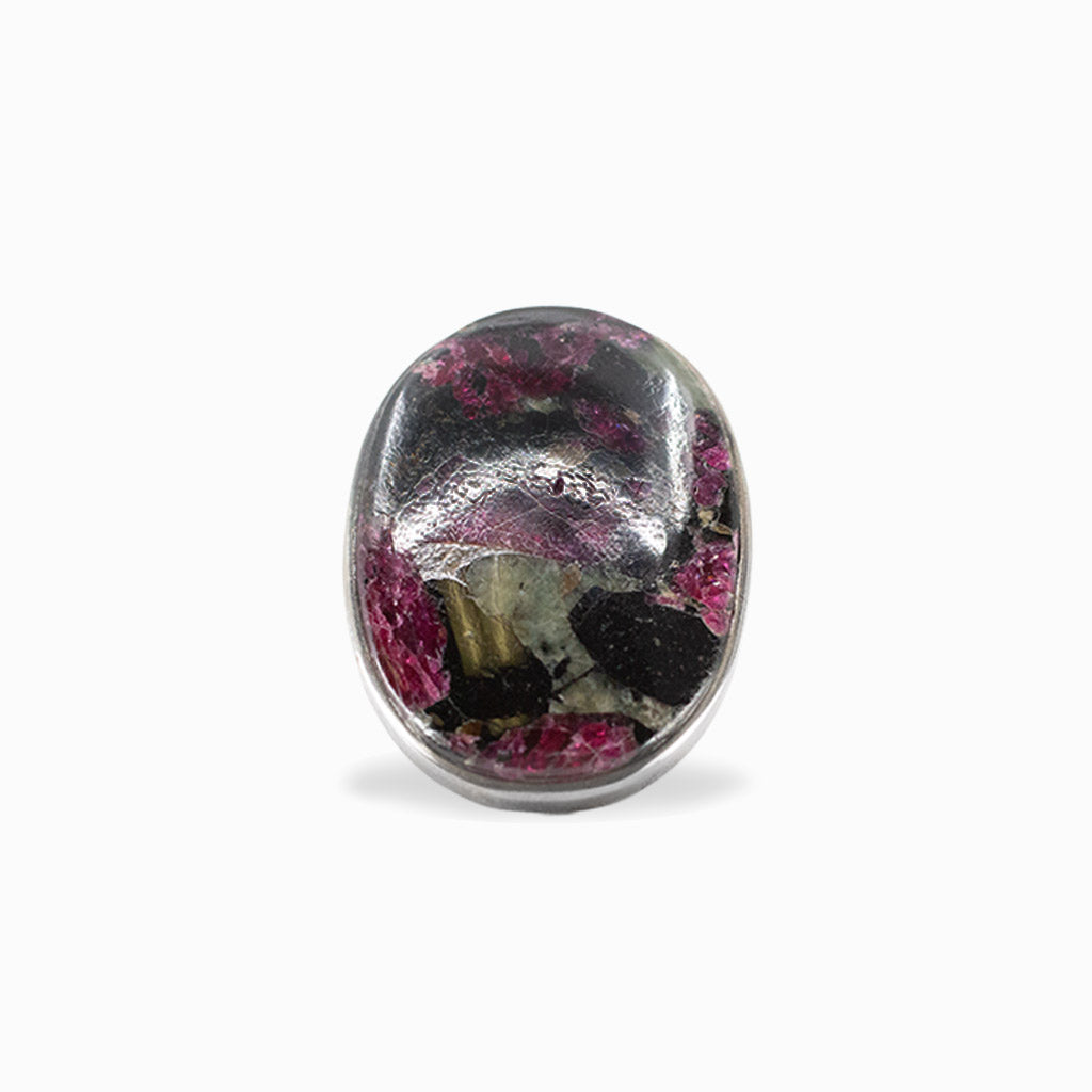 Oval Eudialyte cabochon with magenta, black and green natural patterning set in 925 sterling silver.