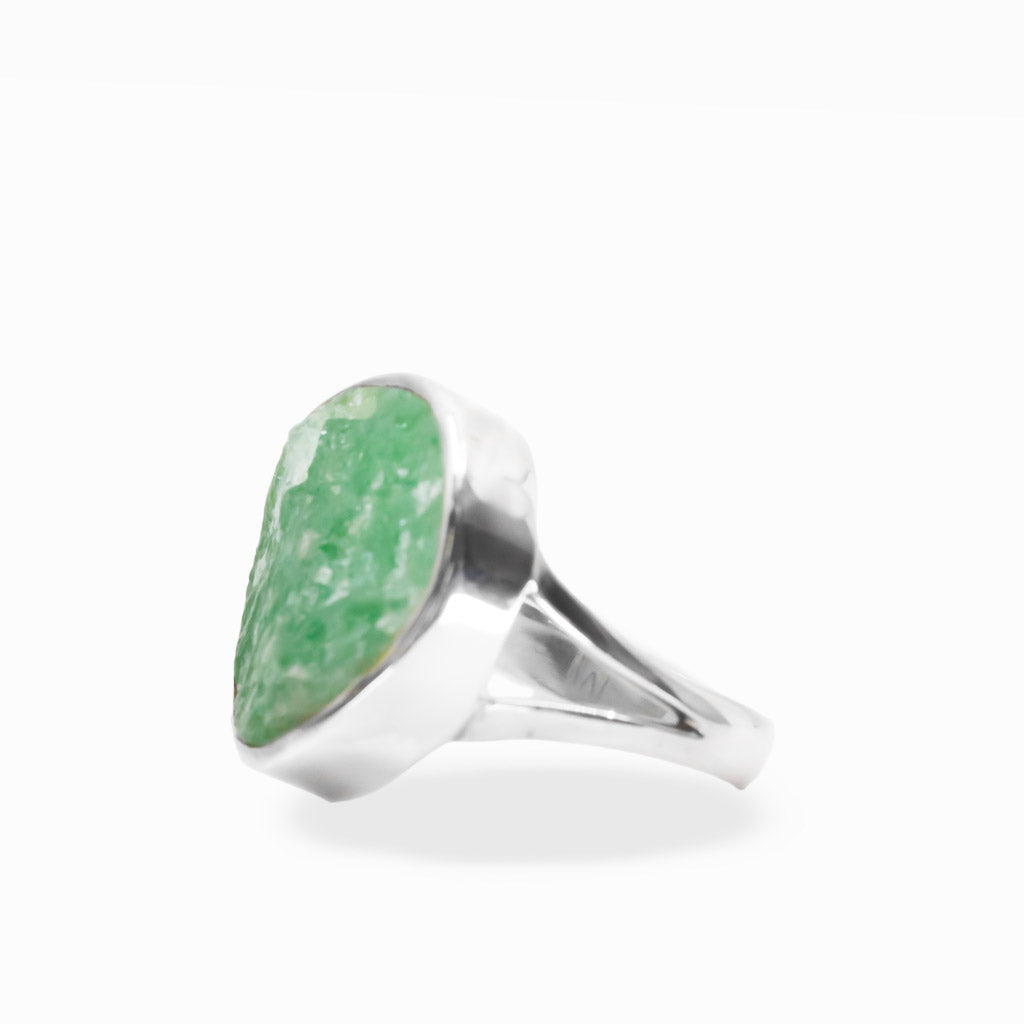 Round mint-green Aventurine ring with natural crystalline texture, polished sterling silver bezel setting, and split band.