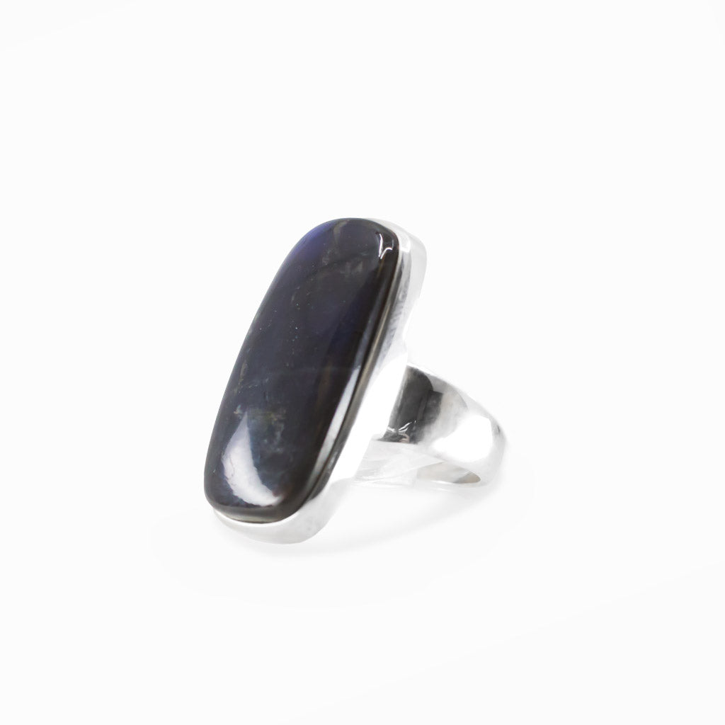 Spectralite Labradorite rectangular cabochon ring in polished sterling silver displaying an intense electric blue natural flash.