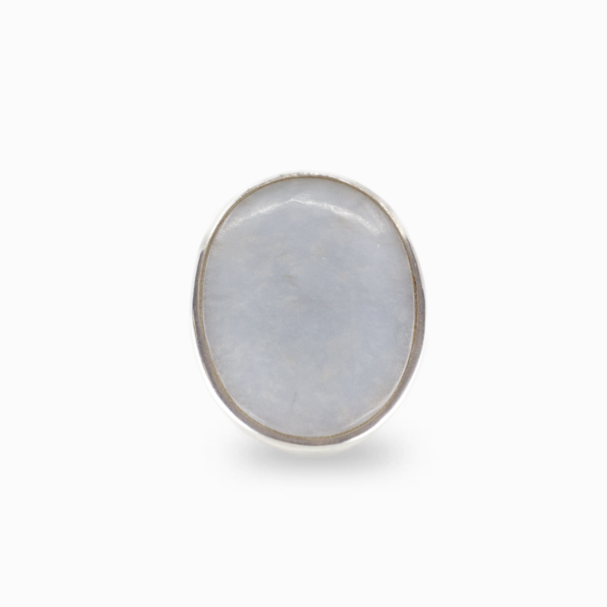 Oval angelite gemstone ring with milky blue cabochon set in silver
