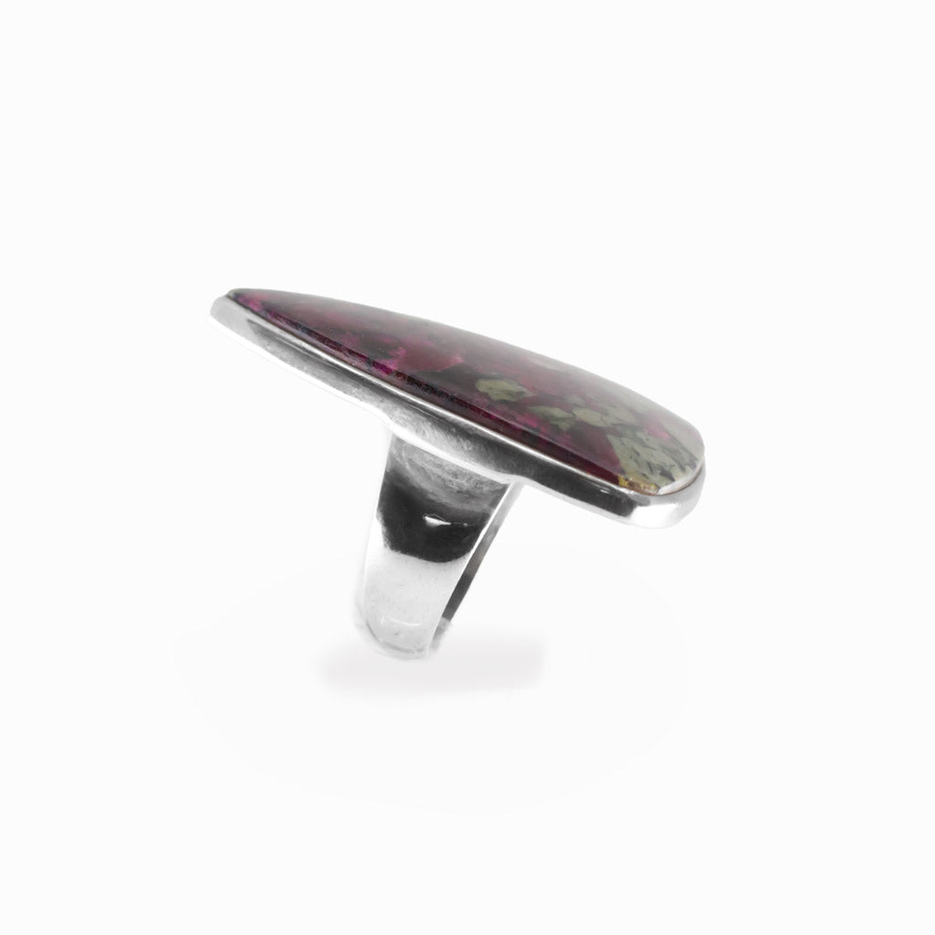 Eudialyte triangular cabochon ring in polished sterling silver with vivid raspberry pink, green and dark natural mineral patterning.