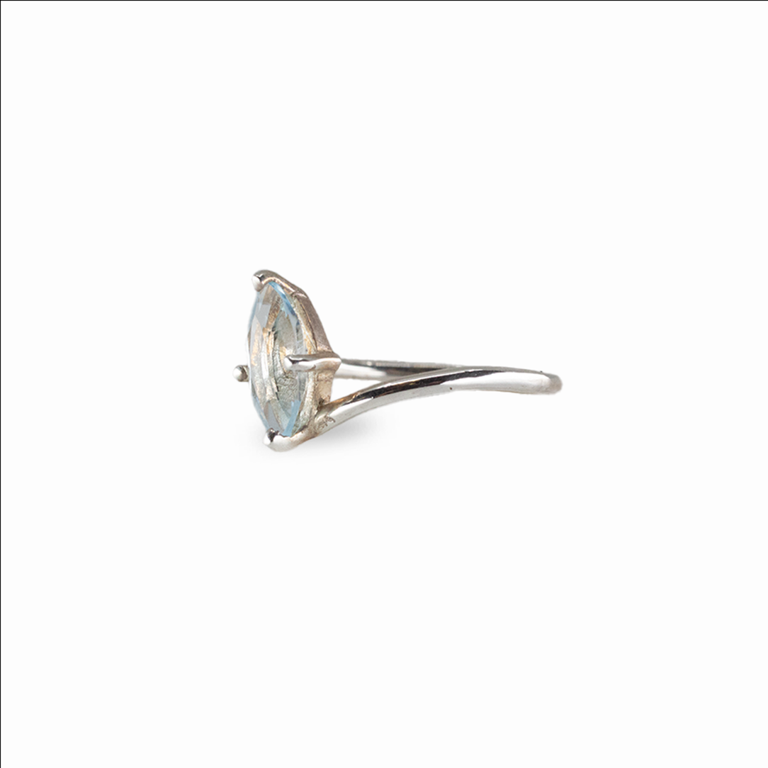 Marquise blue topaz ring with icy faceted gemstone set in sterling silver