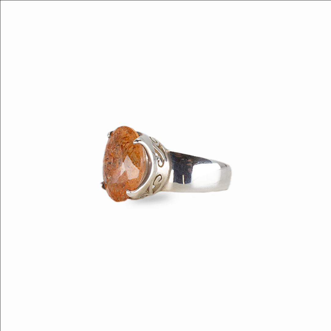 Oval sunstone gemstone ring in sterling silver with warm orange tones and natural sparkling inclusions