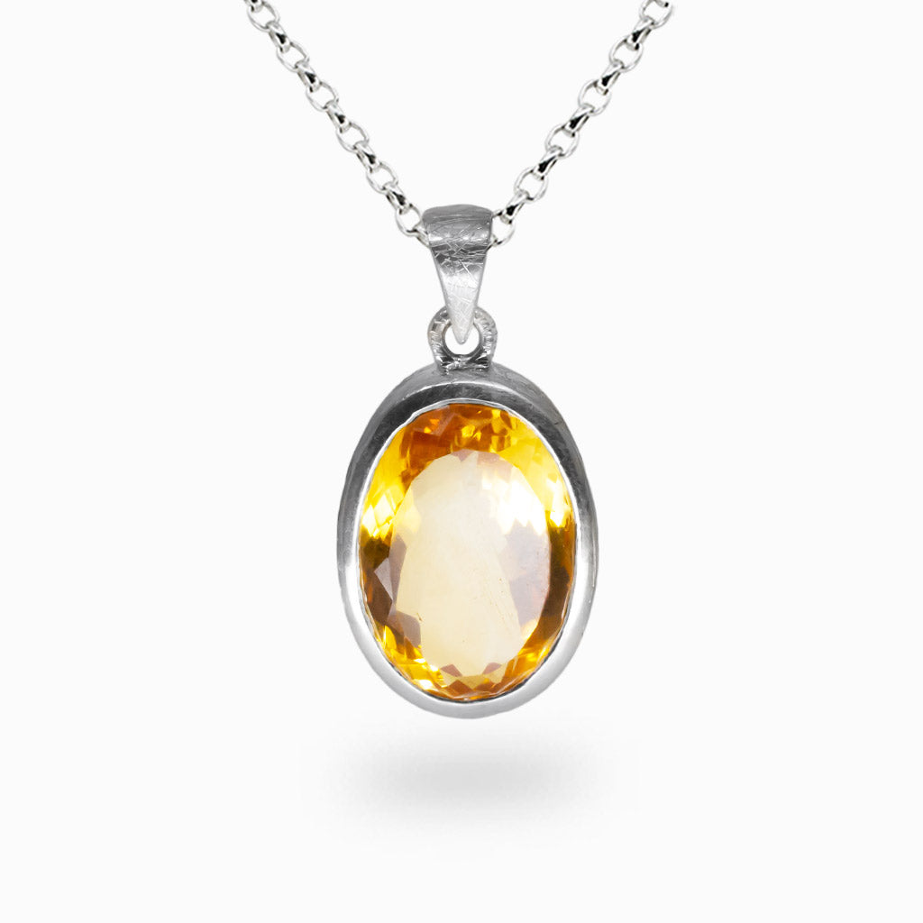 Faceted oval citrine necklace with golden yellow gemstone set in sterling silver. | MADE IN EARTH 