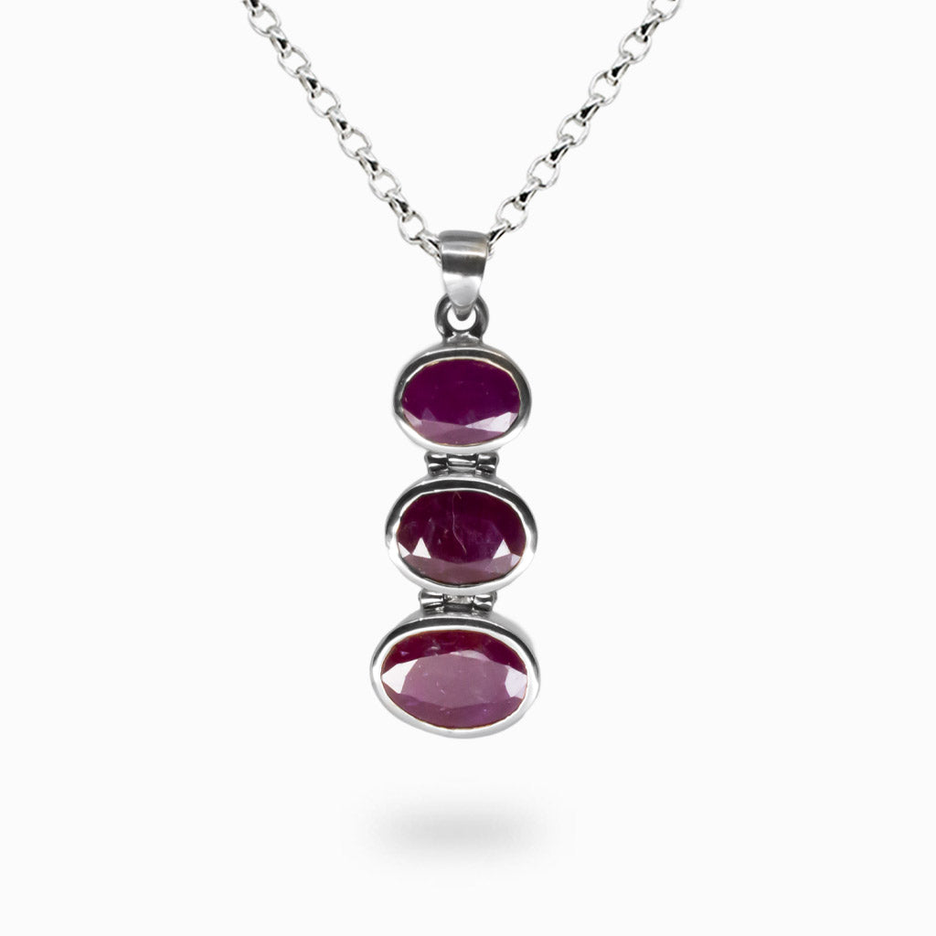 Triple faceted ruby necklace with oval red gemstones set in sterling silver. | MADE IN EARTH