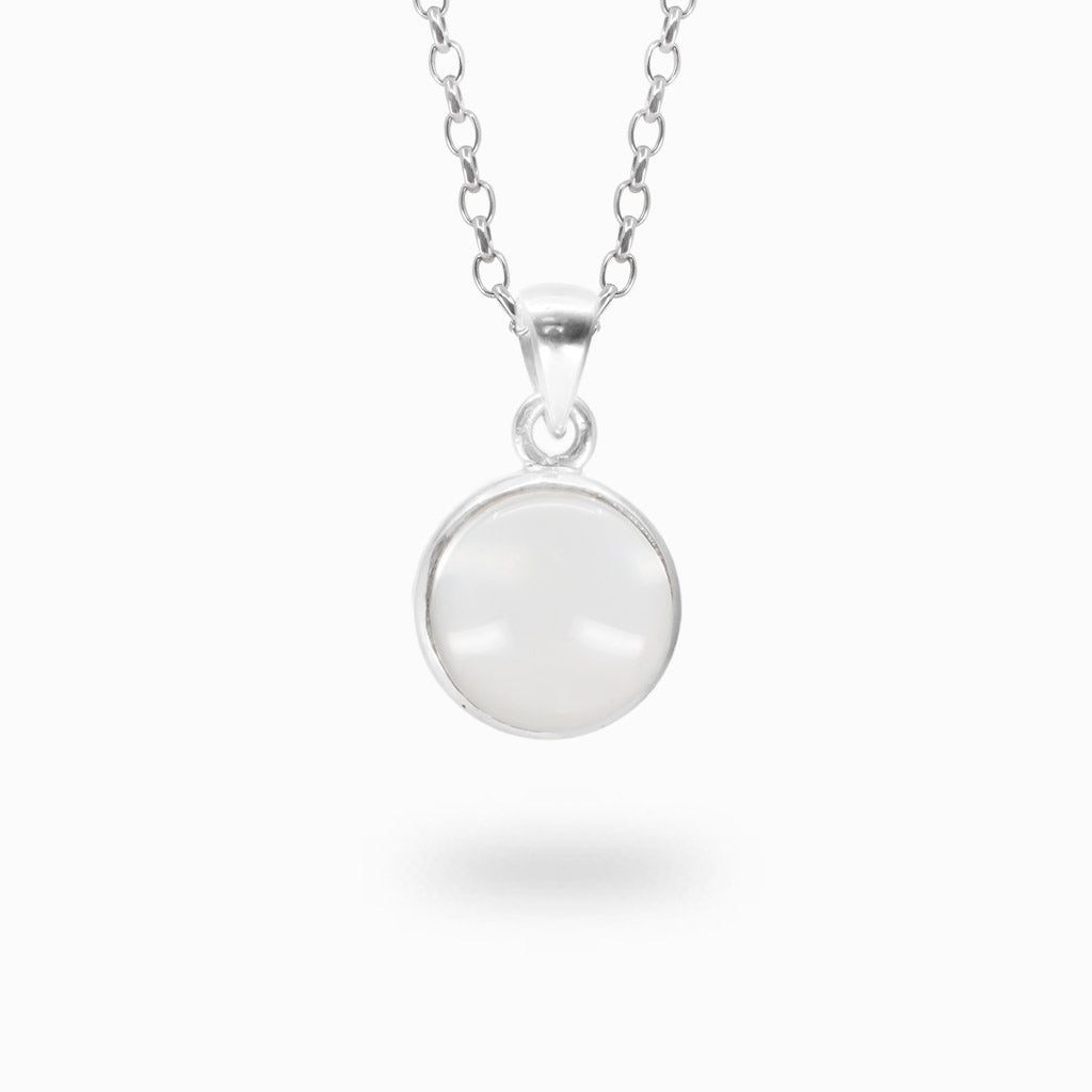 Round milky-white Metamorphis Quartz cabochon pendant set in polished 925 sterling silver.
