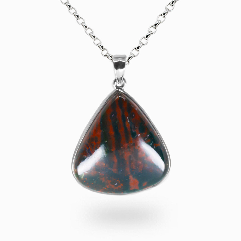 Teardrop-shaped Bloodstone pendant necklace with deep green stone and natural dark red veining, polished finish, set in sterling silver on a silver chain. | MADE IN EARTH