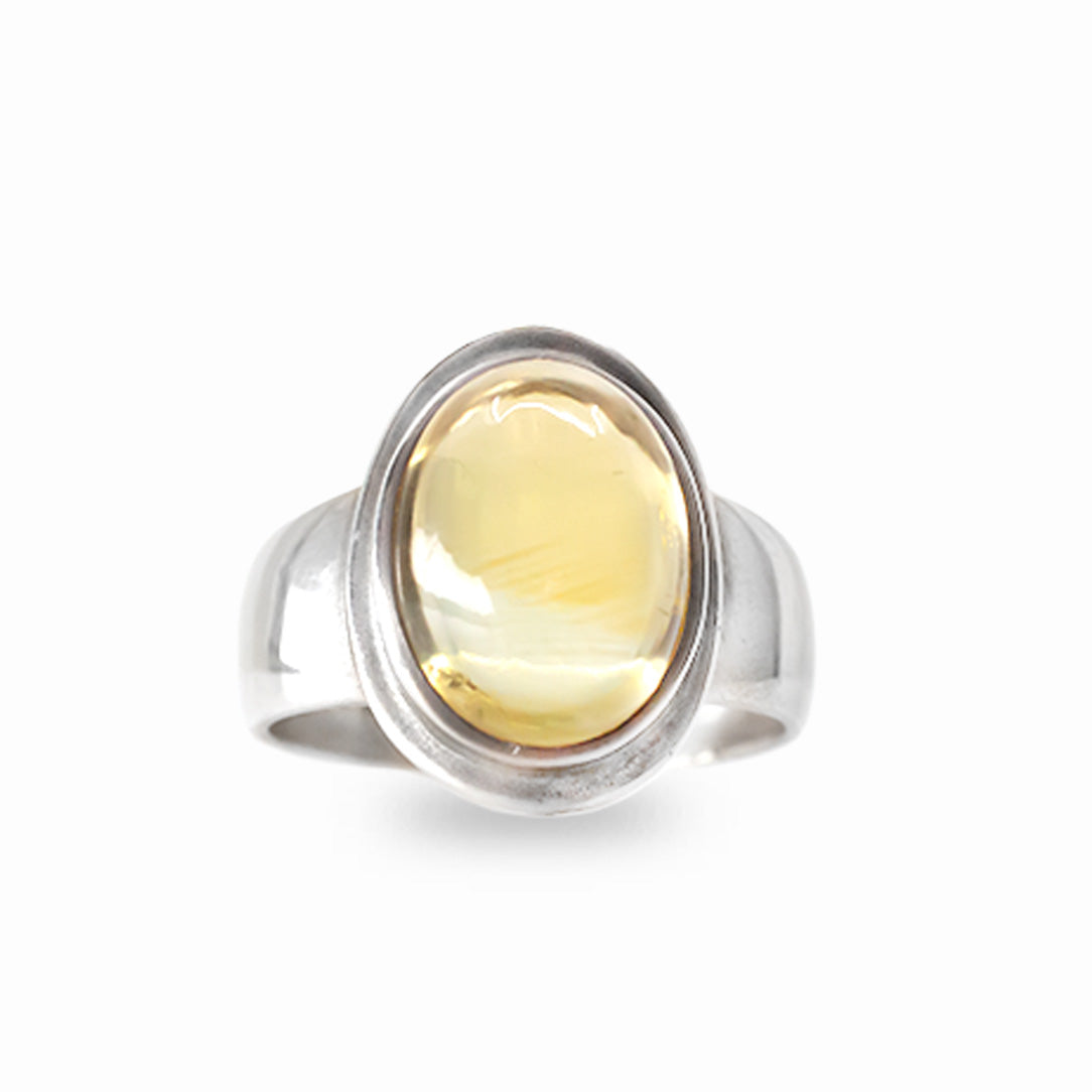 Oval golden-yellow Citrine cabochon ring set in polished 925 sterling silver.