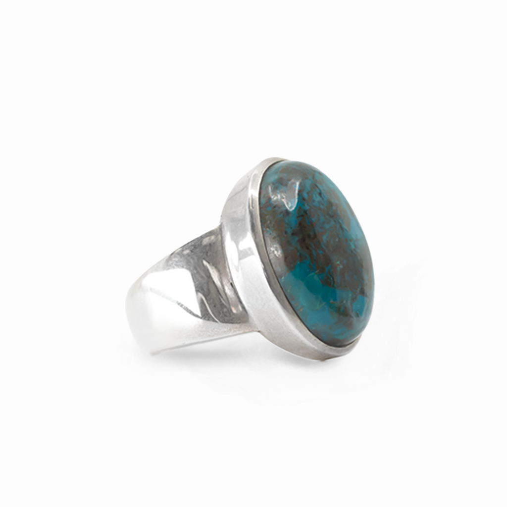 Oval turquoise-blue Shattuckite cabochon ring with natural matrix in polished 925 sterling silver.