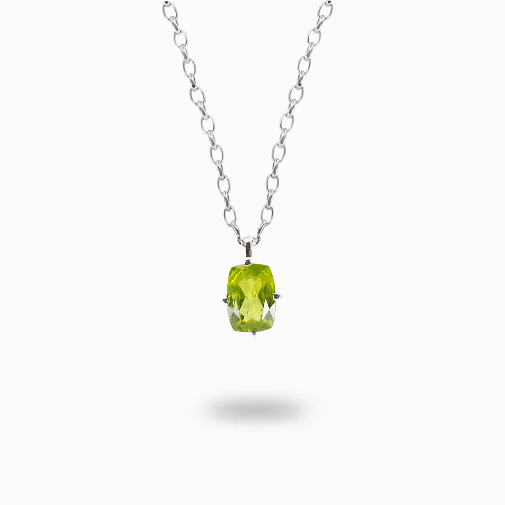 Faceted peridot pendant necklace in sterling silver