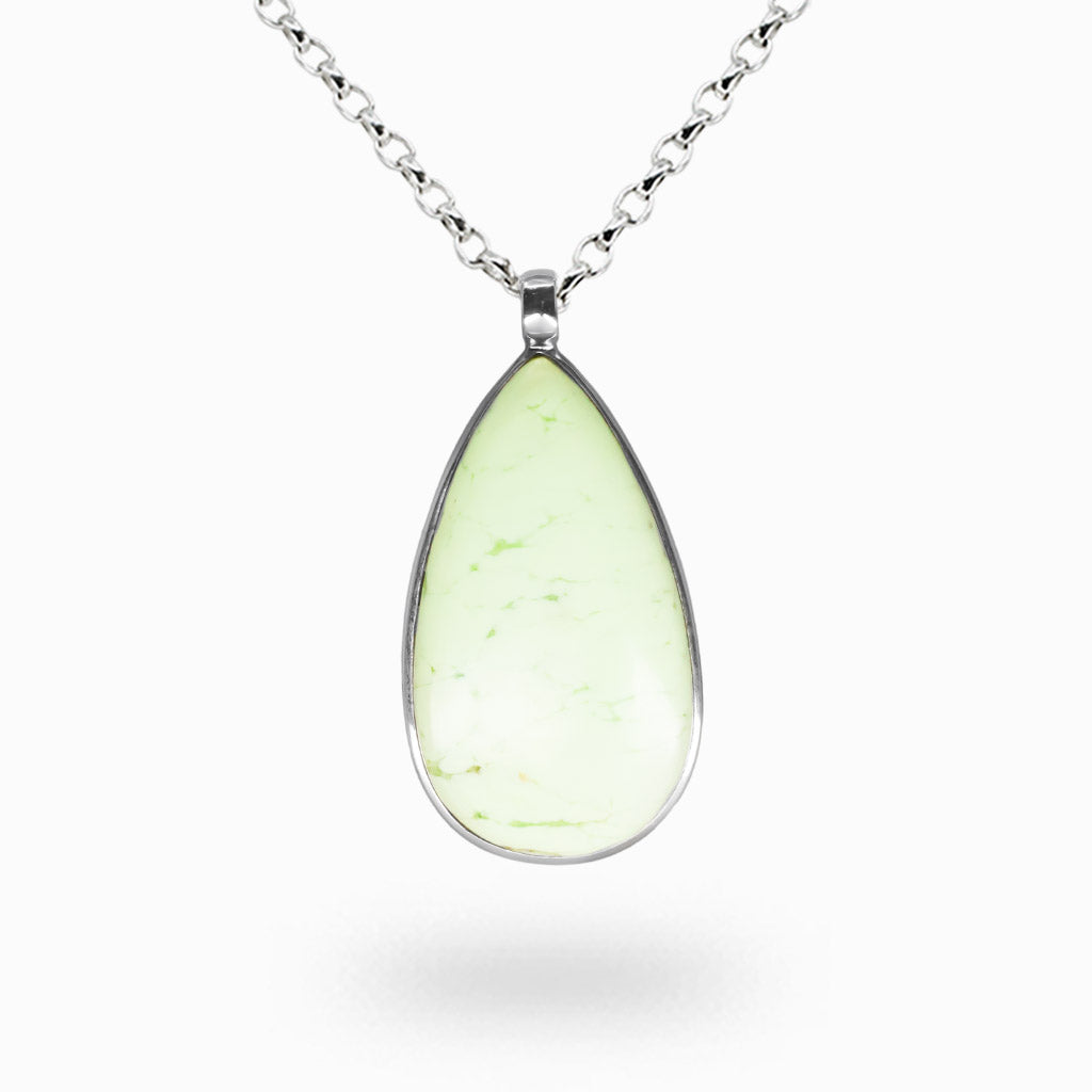 Lemon chrysoprase necklace in sterling silver featuring a glowing teardrop cabochon known for creativity, positivity, and emotional balance.