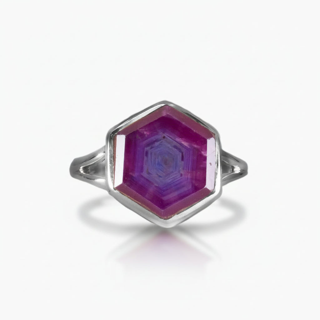 Hexagonal ruby slice ring in sterling silver with concentric growth patterns on a white background | MADE IN EARTH