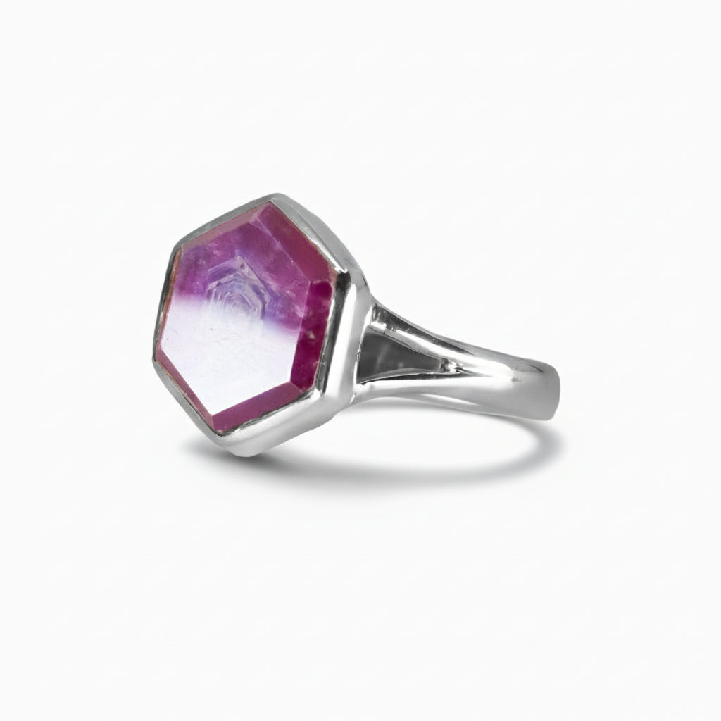 Hexagonal ruby slice ring in sterling silver with concentric growth patterns on a white background | MADE IN EARTH
