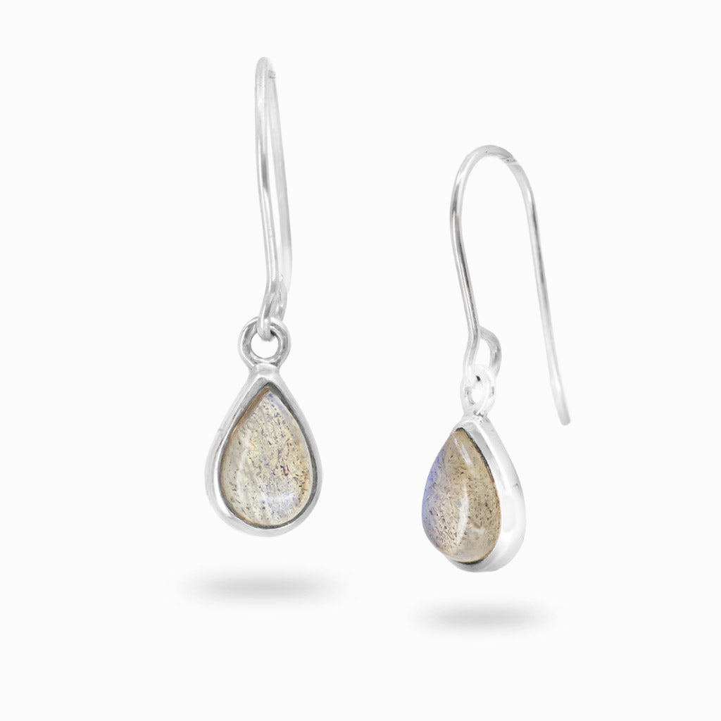 A pair of silver teardrop drop earrings with iridescent, shimmering beige and gray gemstone centers, shown against a plain white background.