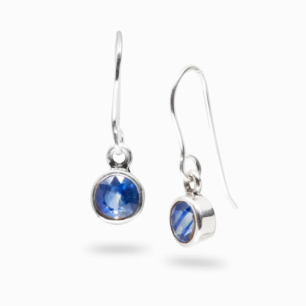 Faceted blue kyanite round bezel drop earrings in sterling silver with deep blue gemstone