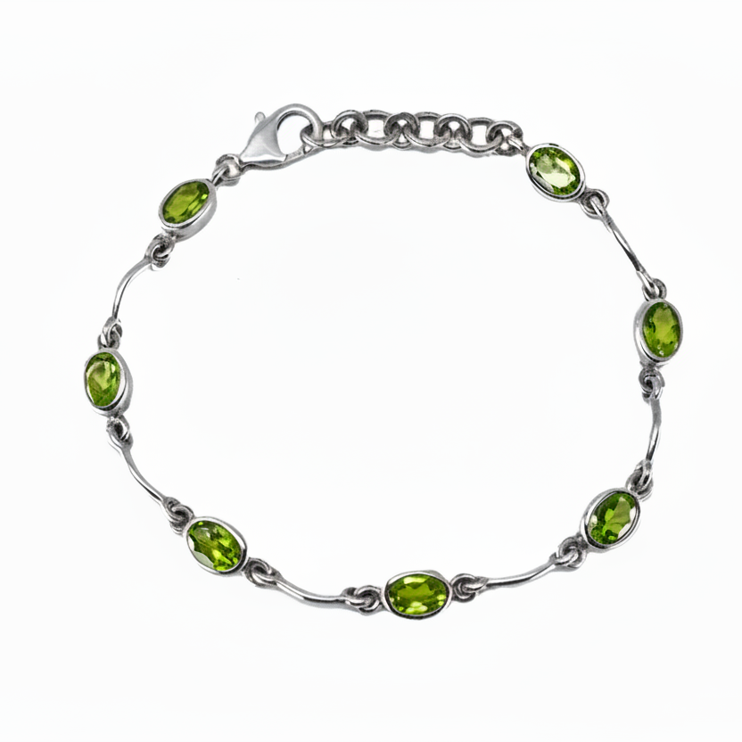 Faceted peridot bracelet with bright green gemstones set in sterling silver