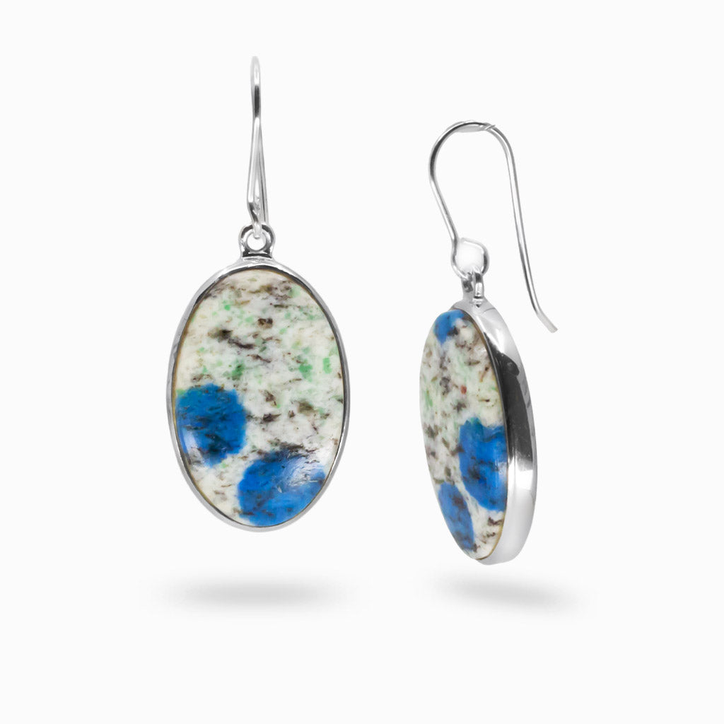K2 Jasper teardrop cabochon drop earrings in sterling silver featuring white stone with vivid blue azurite flecks. | MADE IN EARTH 
