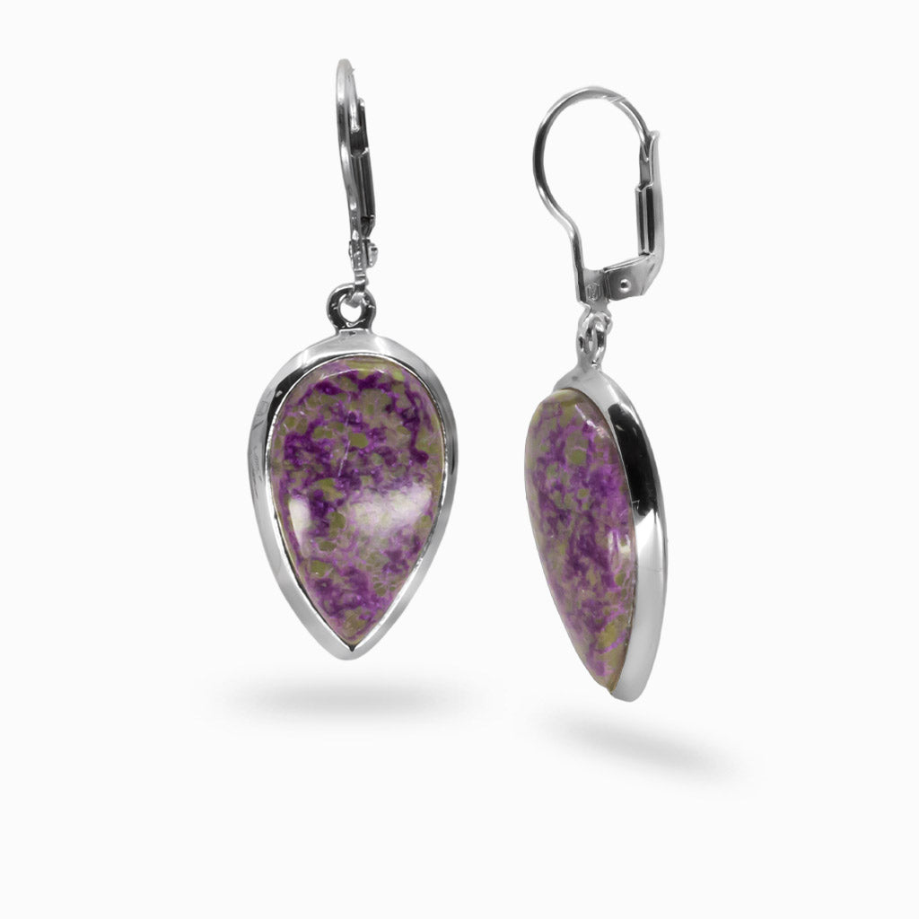 Teardrop-shaped earrings with purple and green stone on a white background