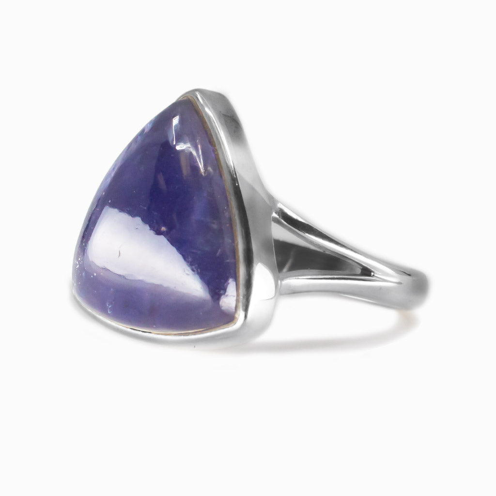 Triangle iolite cabochon ring set in sterling silver bezel with blue violet gemstone. MADE IN EARTH