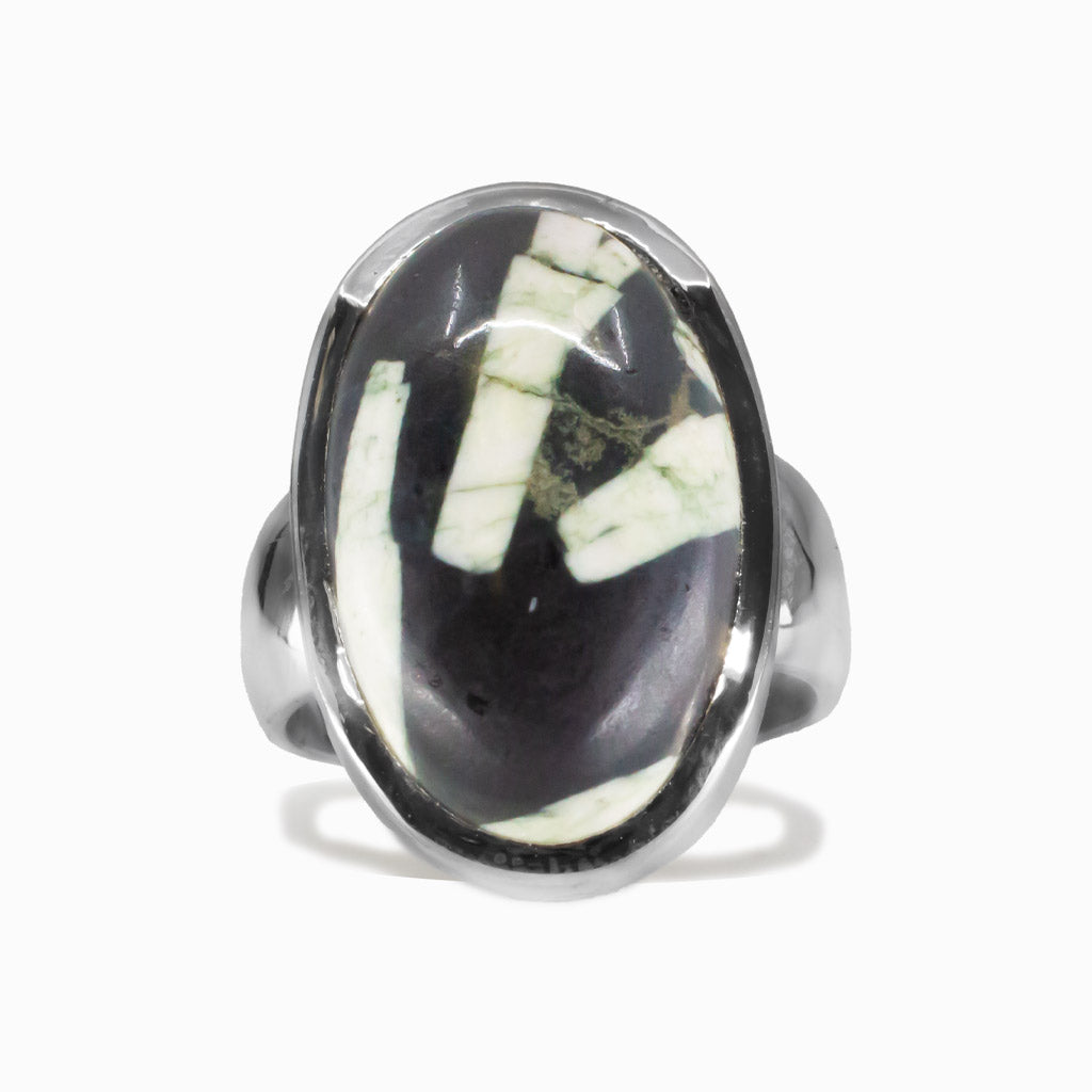 Oval Chinese Writing Rock cabochon ring set in sterling silver with black patterned stone. MADE IN EARTH