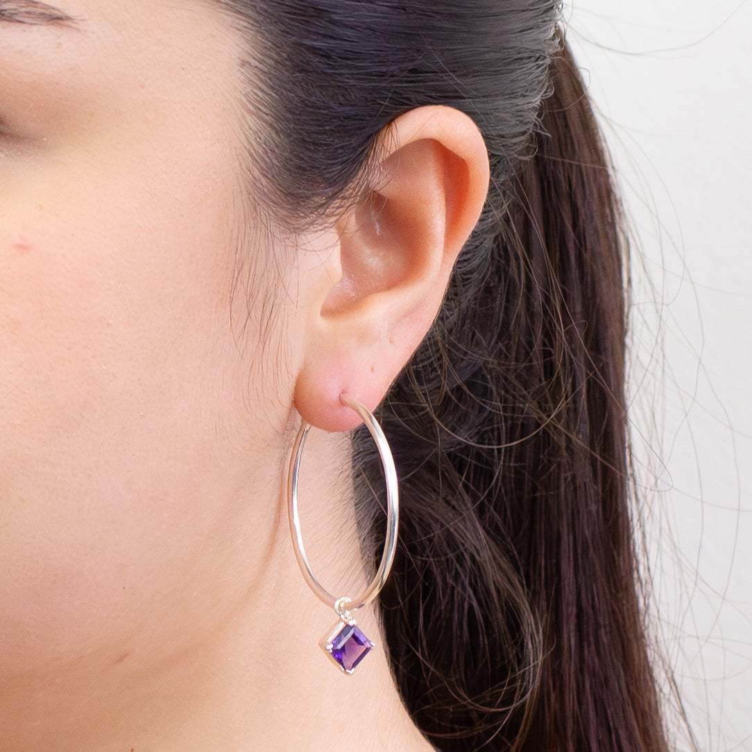 Faceted diamond-shaped amethyst gemstone hoop charms in sterling silver setting