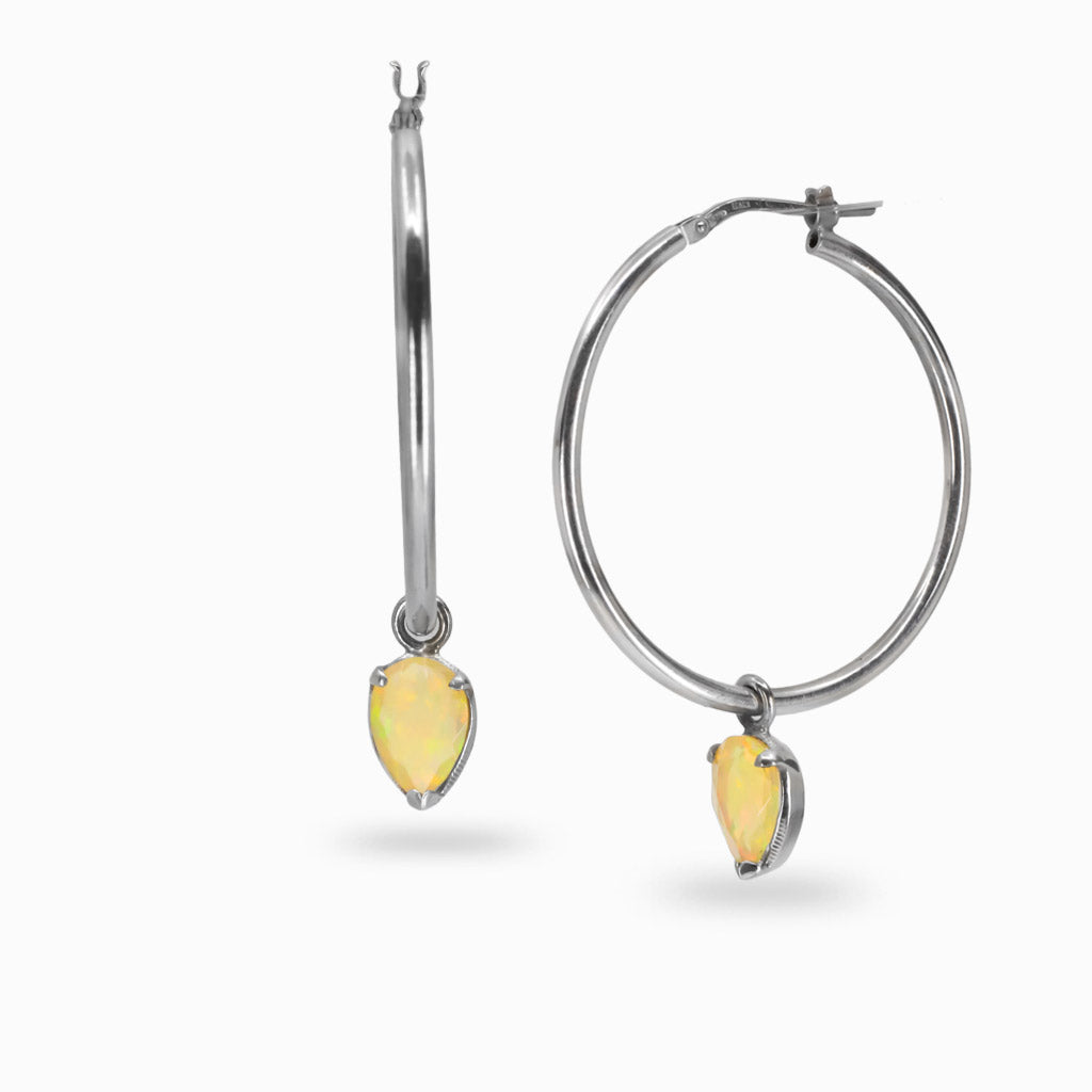 Faceted teardrop precious opal hoop charms with rainbow play-of-color in sterling silver. MADE IN EARTH