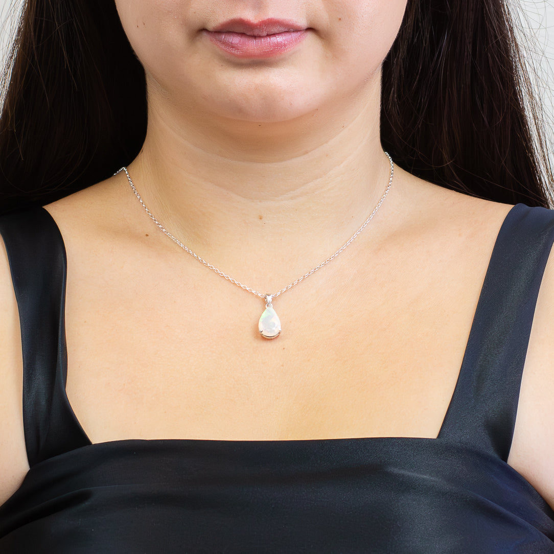 MODEL WEARING Teardrop faceted Australian Precious Opal pendant in sterling silver. | MADE IN EARTH