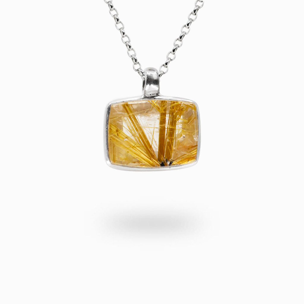 Rectangle Golden Rutilated Quartz pendant displaying natural golden rutile inclusions handcrafted in sterling silver.
