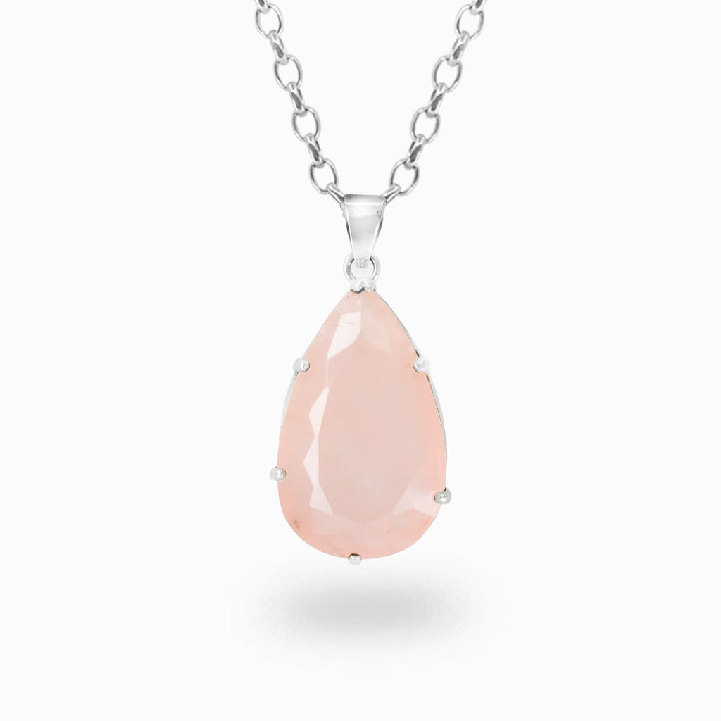 Faceted teardrop Rose Quartz pendant necklace in sterling silver featuring soft natural pink gemstone.