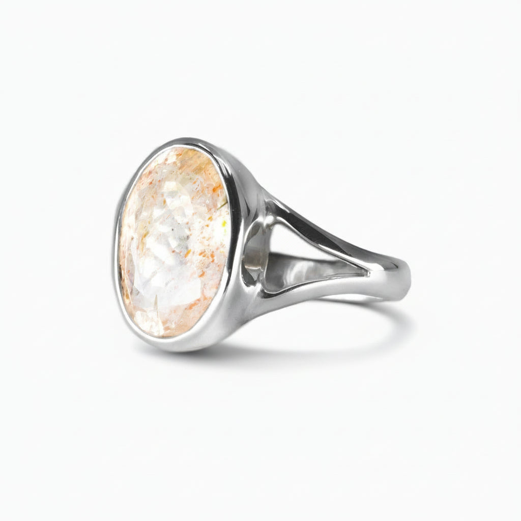 Oval Lepidocrocite-in-Quartz ring with fiery red and golden inclusions set in polished sterling silver | MADE IN EARTH USA