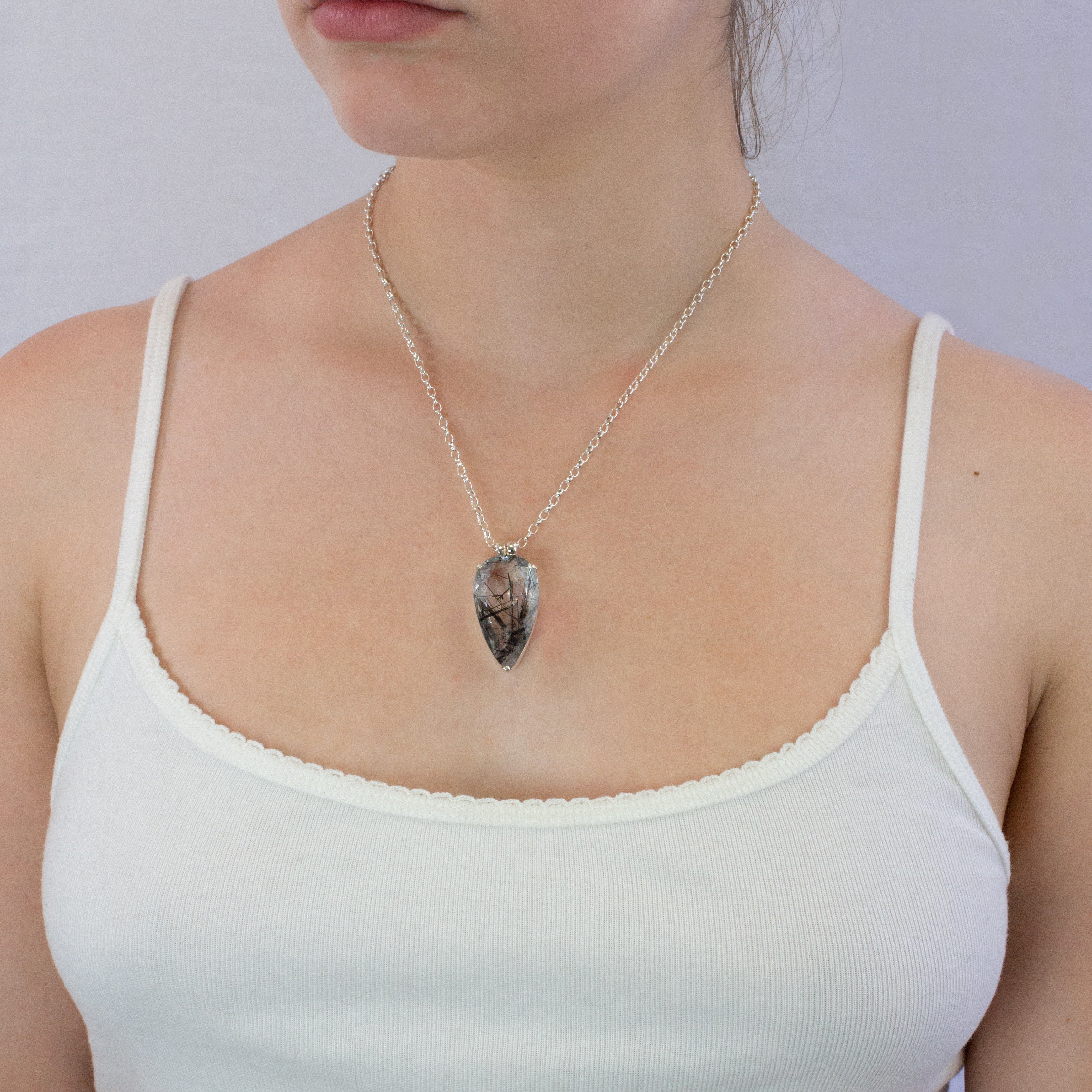 Tourmalinated Quartz necklace on model
