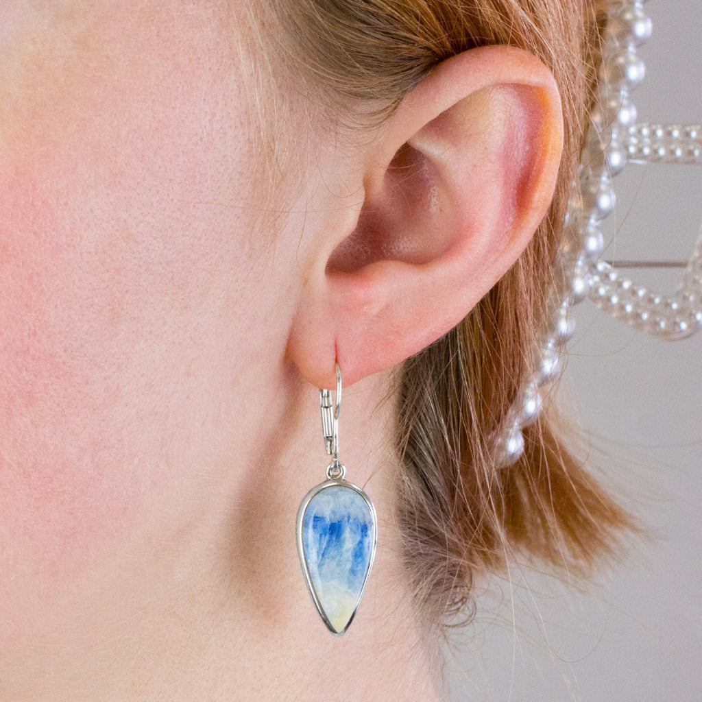 Scheelite drop earrings on model