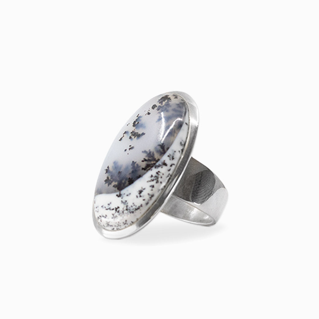 Oval Dendritic Opal cabochon with natural black branching inclusions set in 925 sterling silver.