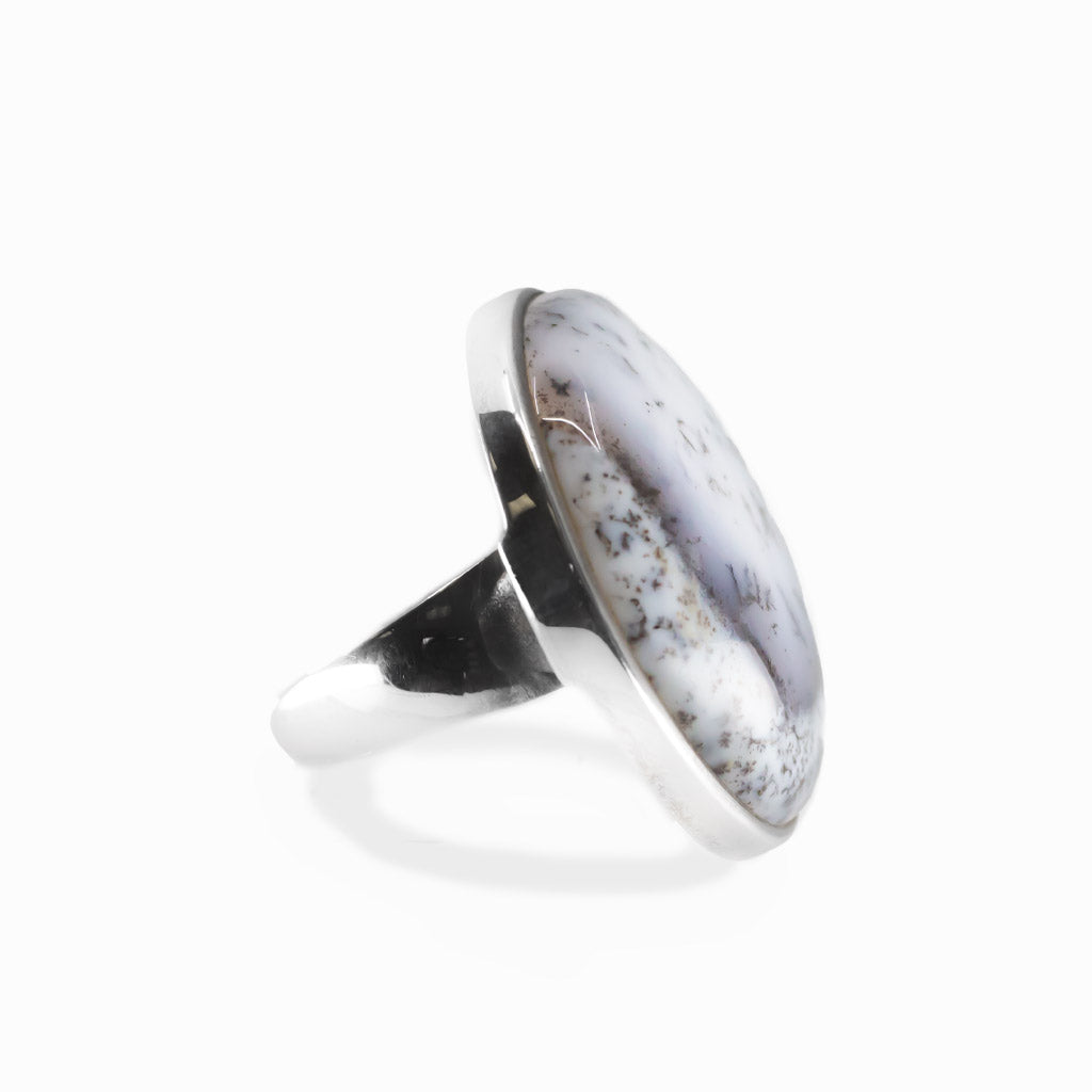 Dendritic Opal round cabochon ring in polished sterling silver with milky white tones and delicate natural branch-like dendritic inclusions.