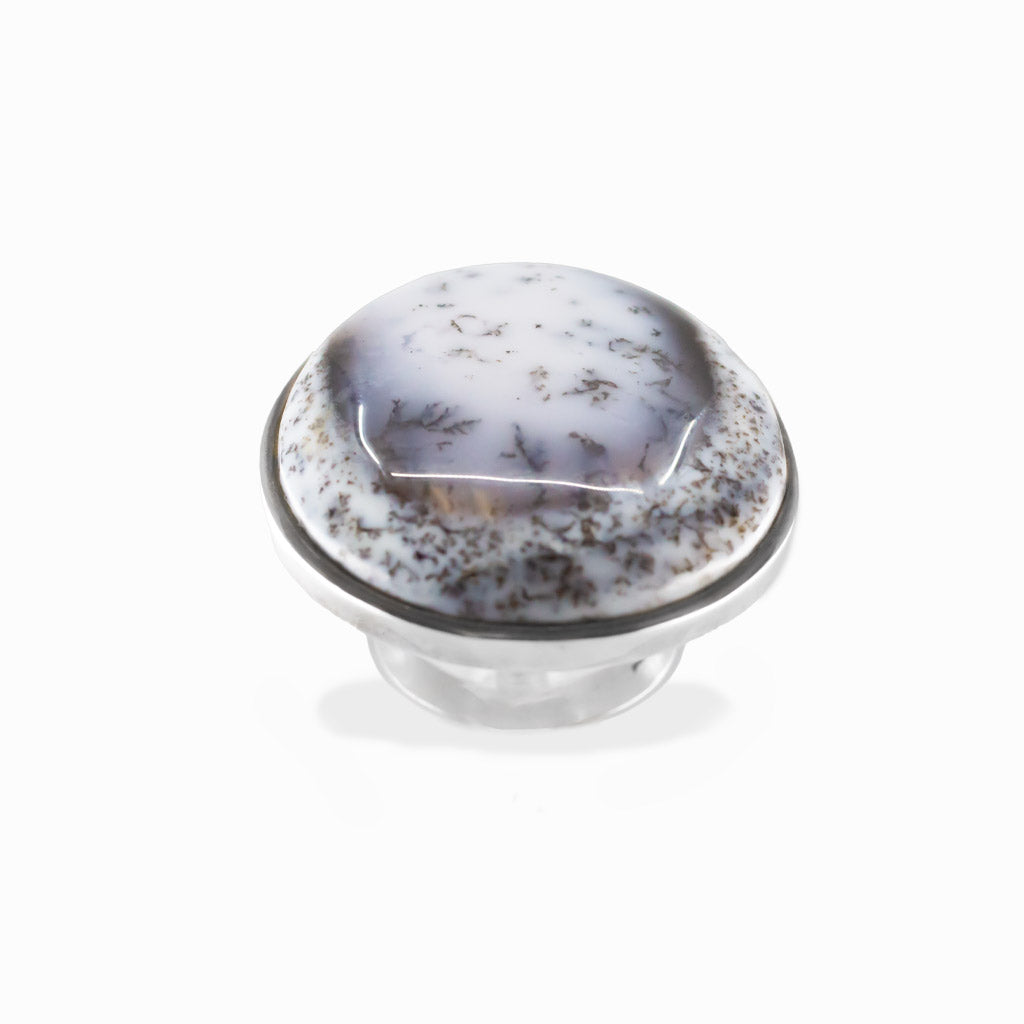 Dendritic Opal round cabochon ring in polished sterling silver with milky white tones and delicate natural branch-like dendritic inclusions.