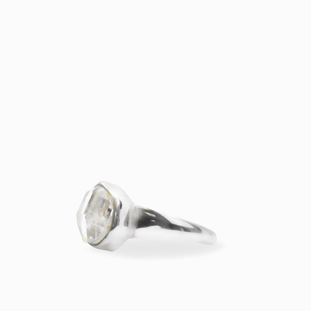 Natural Herkimer Diamond and round Ruby ring in polished 925 sterling silver with an asymmetrical two-stone setting.