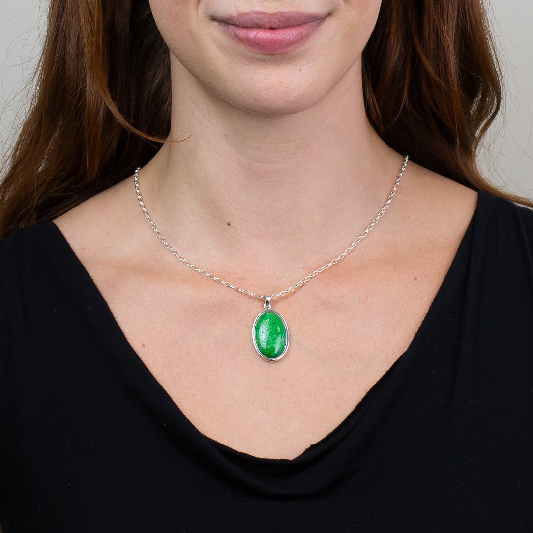 Oval cabochon Maw Sit Sit pendant necklace in sterling silver.