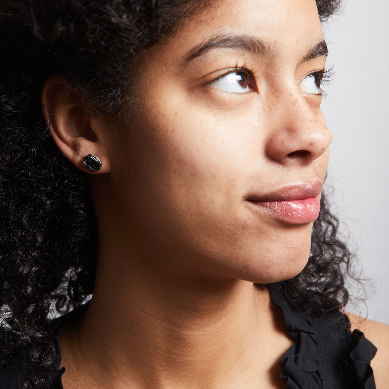 RAW BLACK TOURMALINE STUDS STERLING SILVER ON MODEL| MADE IN EARTH