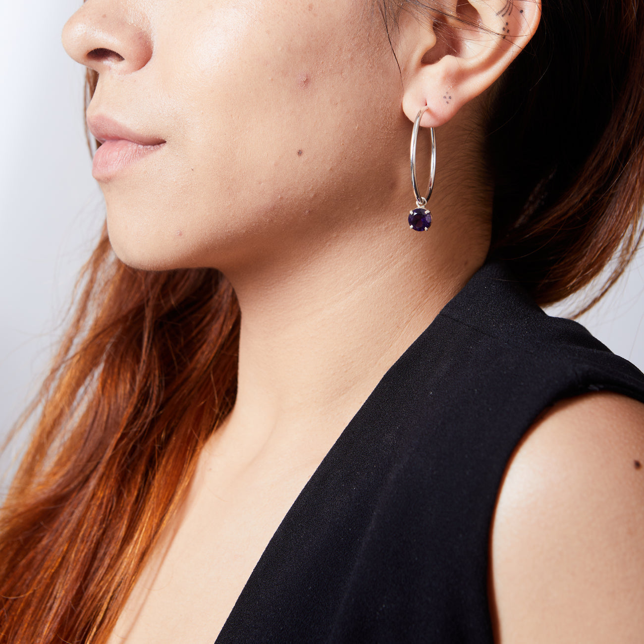 FACETED AMETHYST HOOP CHARMS ON MODEL