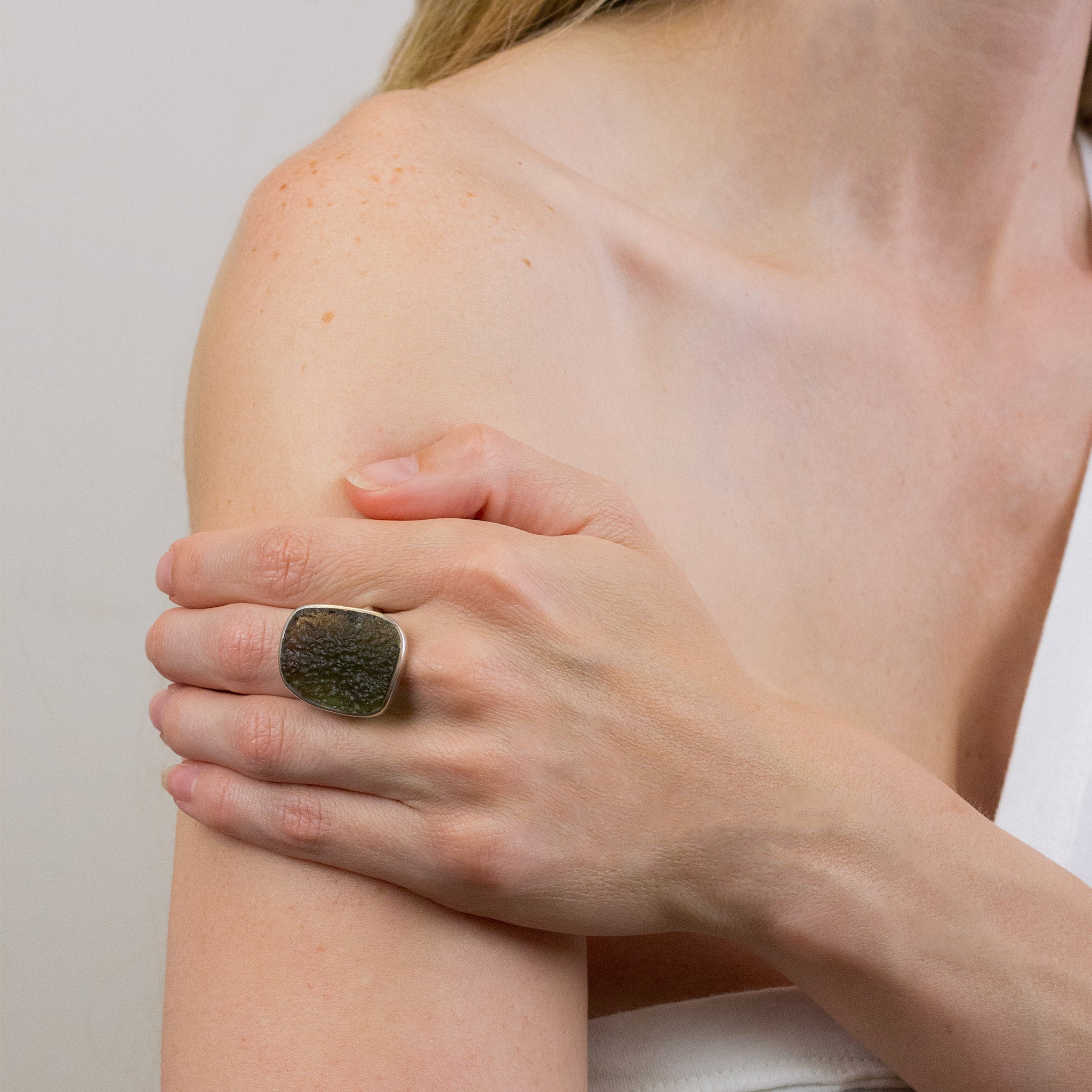 MOLDAVITE RING ON MODEL 