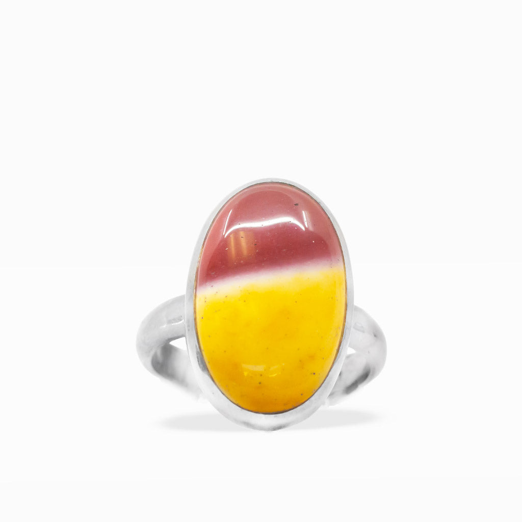 Oval Mookaite Jasper ring featuring vibrant golden yellow, burgundy, and cream color blocking in polished sterling silver bezel setting.