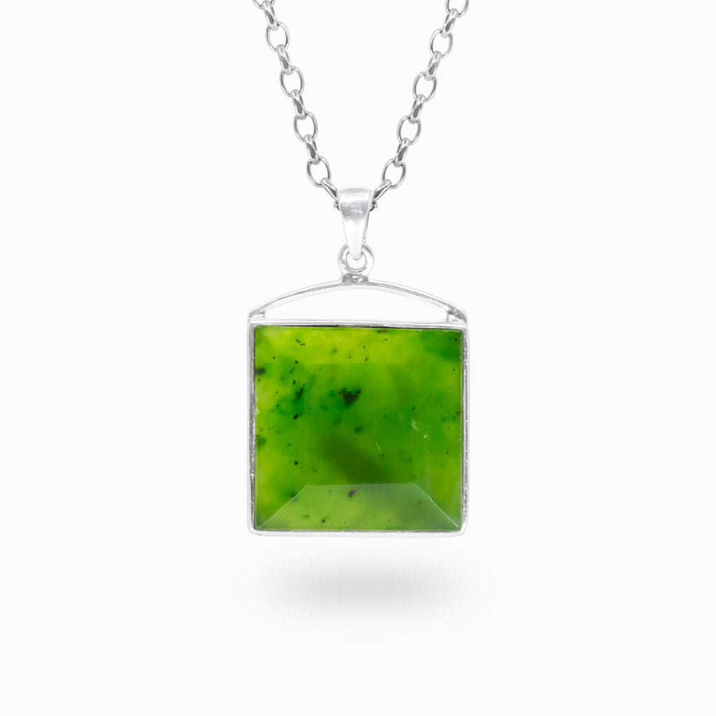 Square vibrant green Nephrite Jade pendant with natural dark inclusions in a polished 925 sterling silver setting.