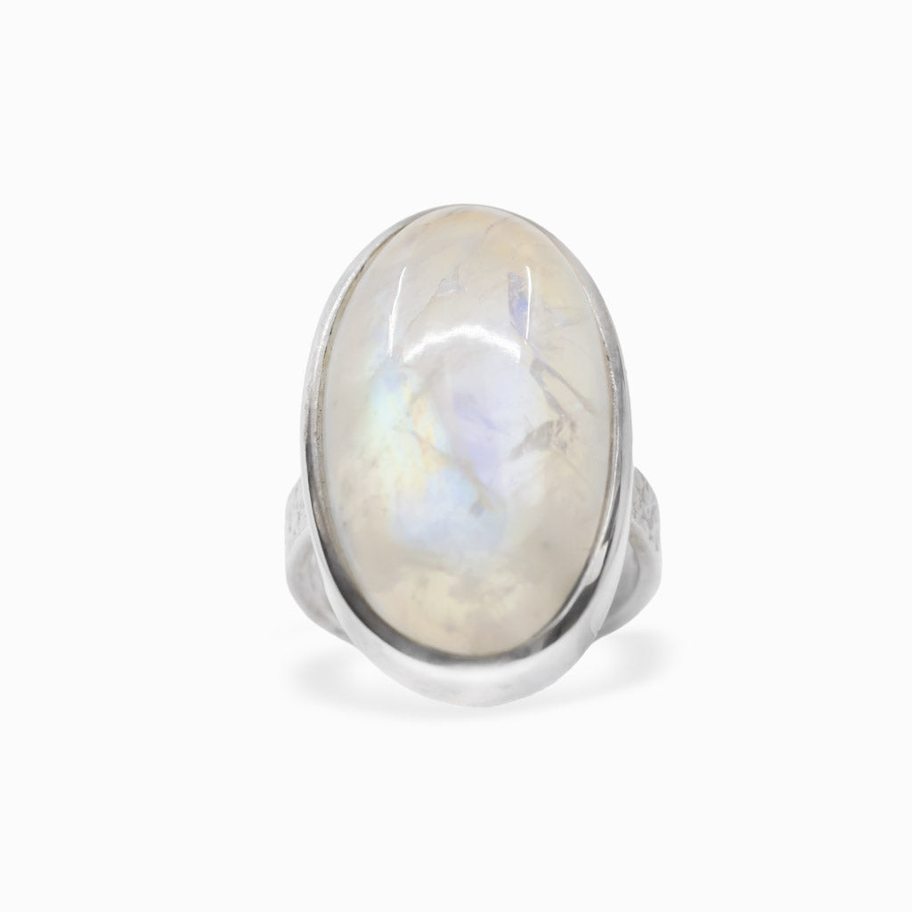 Oval Rainbow Moonstone cabochon sterling silver statement ring with blue iridescence.