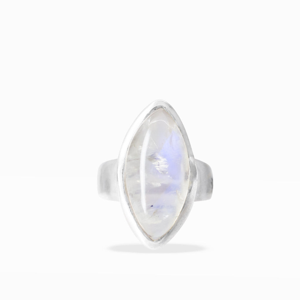 Marquise-shaped Rainbow Moonstone ring with translucent white gemstone, subtle blue flash, and polished sterling silver bezel setting.