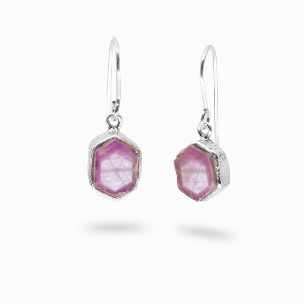 Hexagonal trapiche ruby drop earrings with textured silver bezel