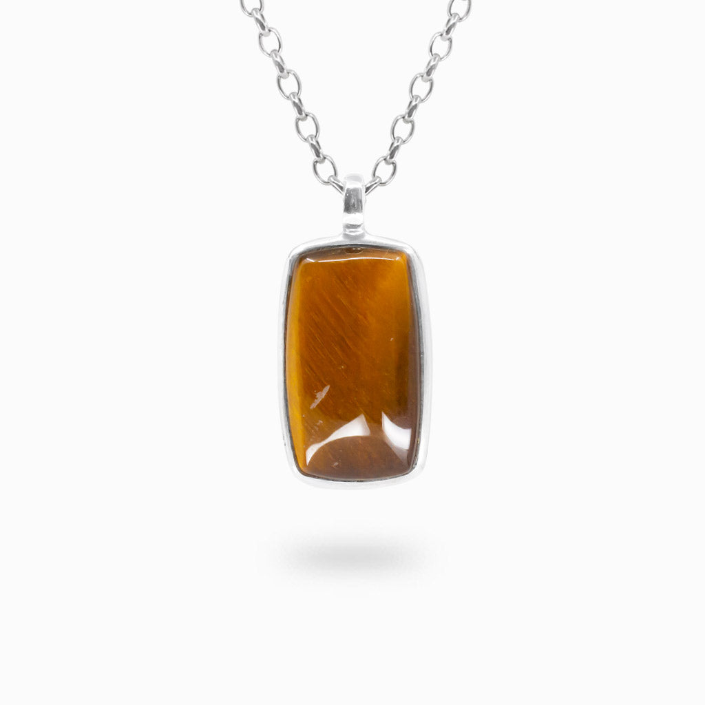 Rectangular golden-brown Tiger Eye cabochon pendant with natural silky bands in a polished 925 sterling silver bezel setting.