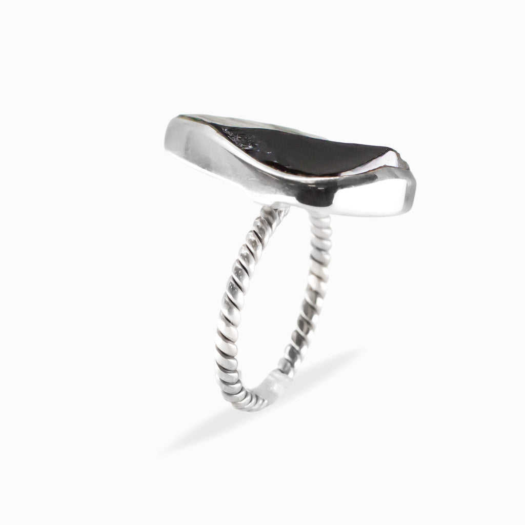 Freeform triangular Apache Obsidian ring in polished 925 sterling silver with a smooth bezel setting.