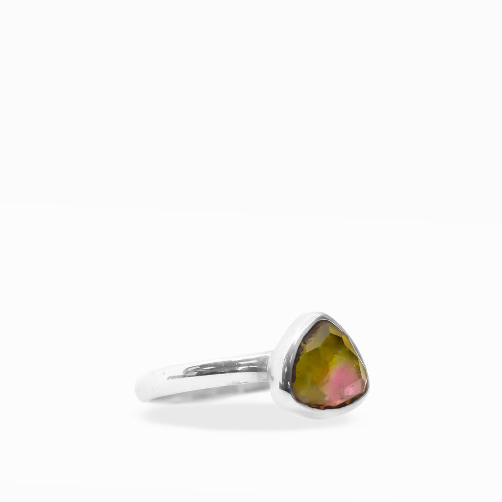 Triangular Watermelon Tourmaline ring with translucent golden-green and pink color zoning, polished sterling silver bezel, and smooth band.