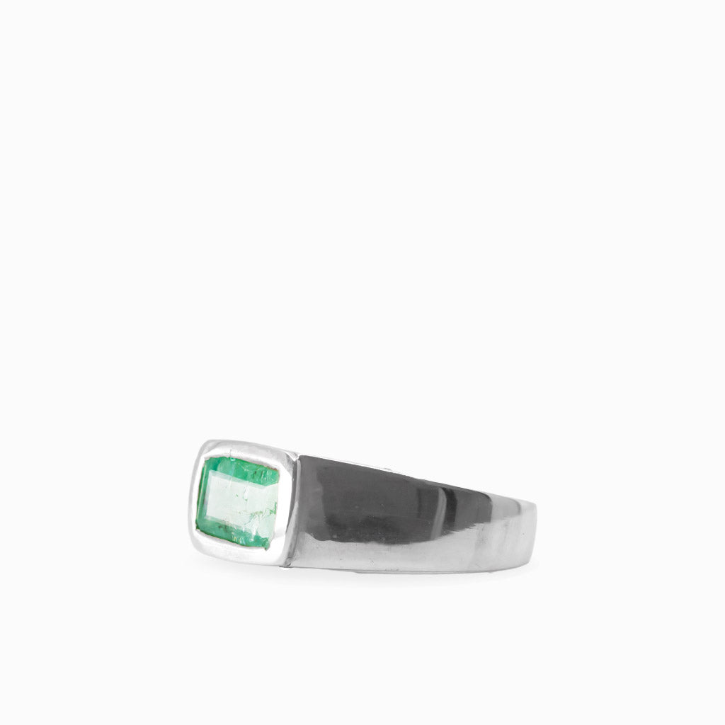 Natural rectangular green Emerald gemstone set in a polished 925 sterling silver ring.