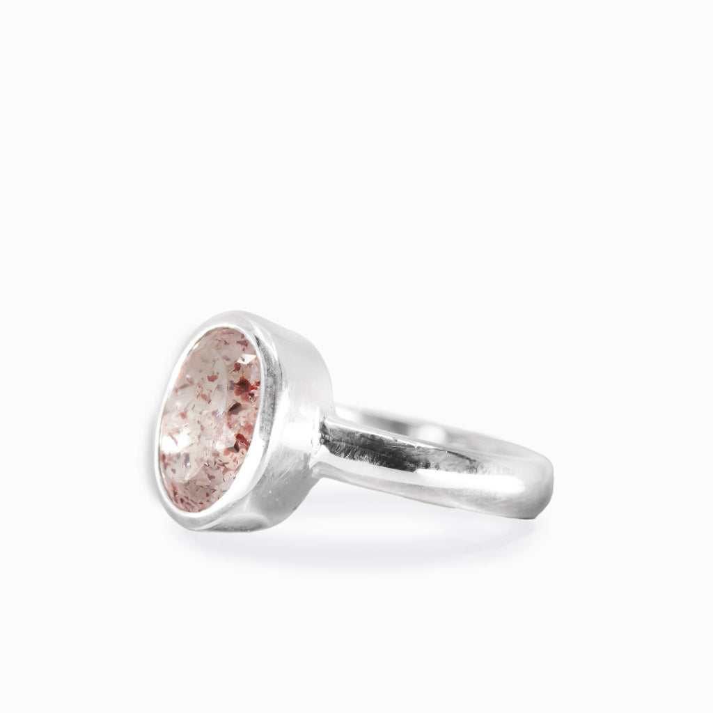 Faceted oval lepidocrocite quartz bezel ring in sterling silver